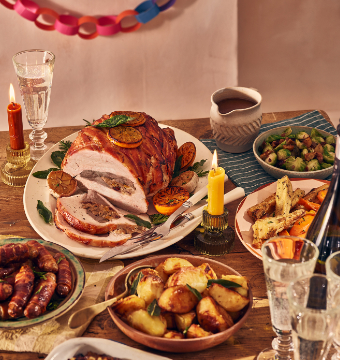 Carved turkey crown with roast potatoes, stuffing and all the trimmings